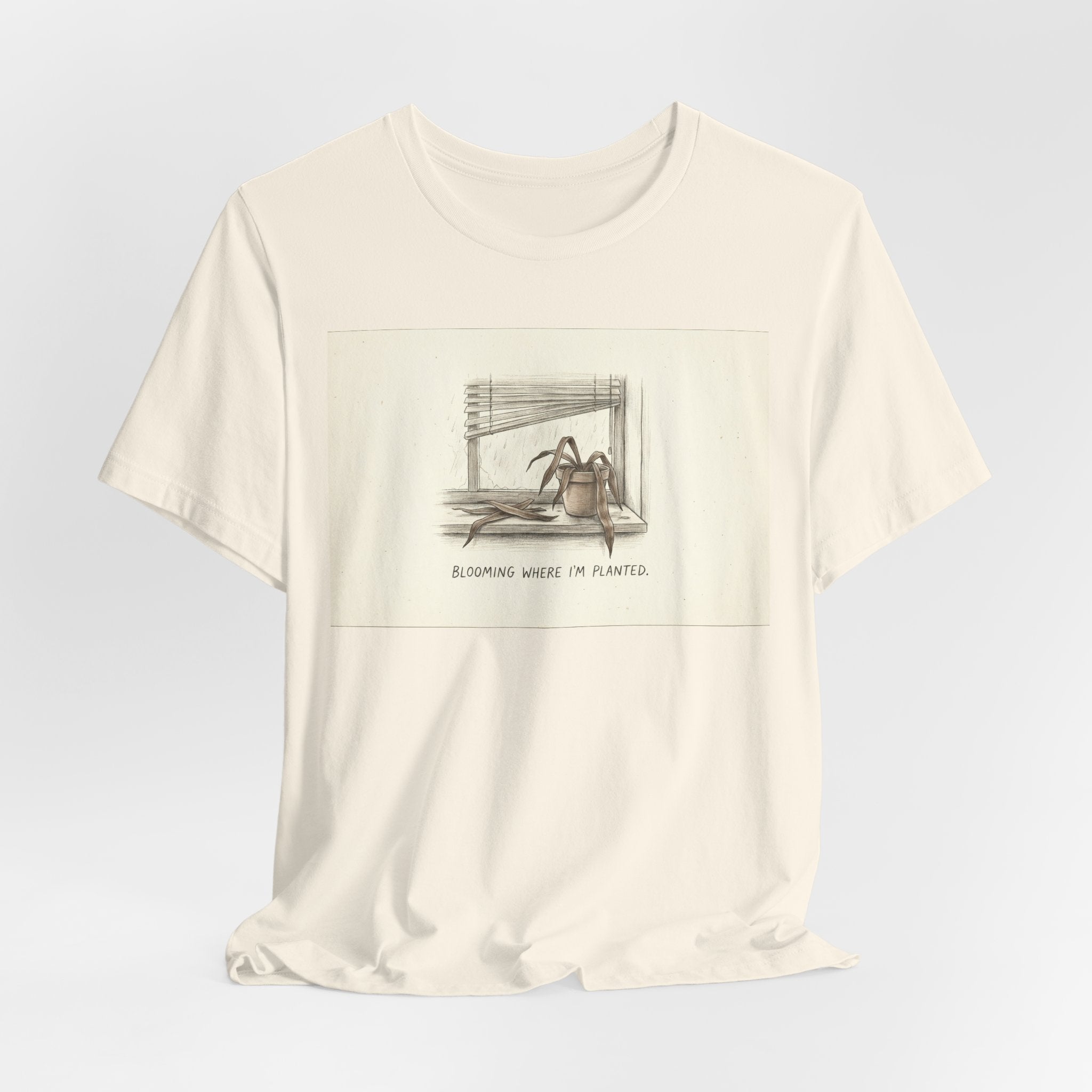 BLOOMING WHERE I'M PLANTED. — Dead Plant Tee · Funny Office Humor Shirt