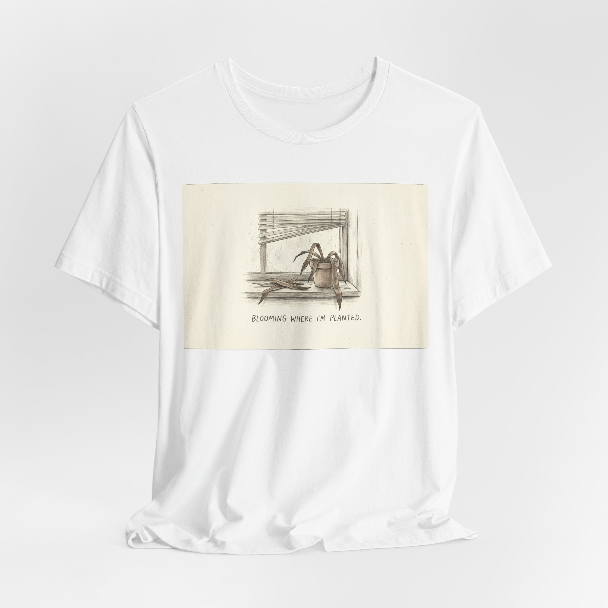 BLOOMING WHERE I'M PLANTED. — Dead Plant Tee · Funny Office Humor Shirt